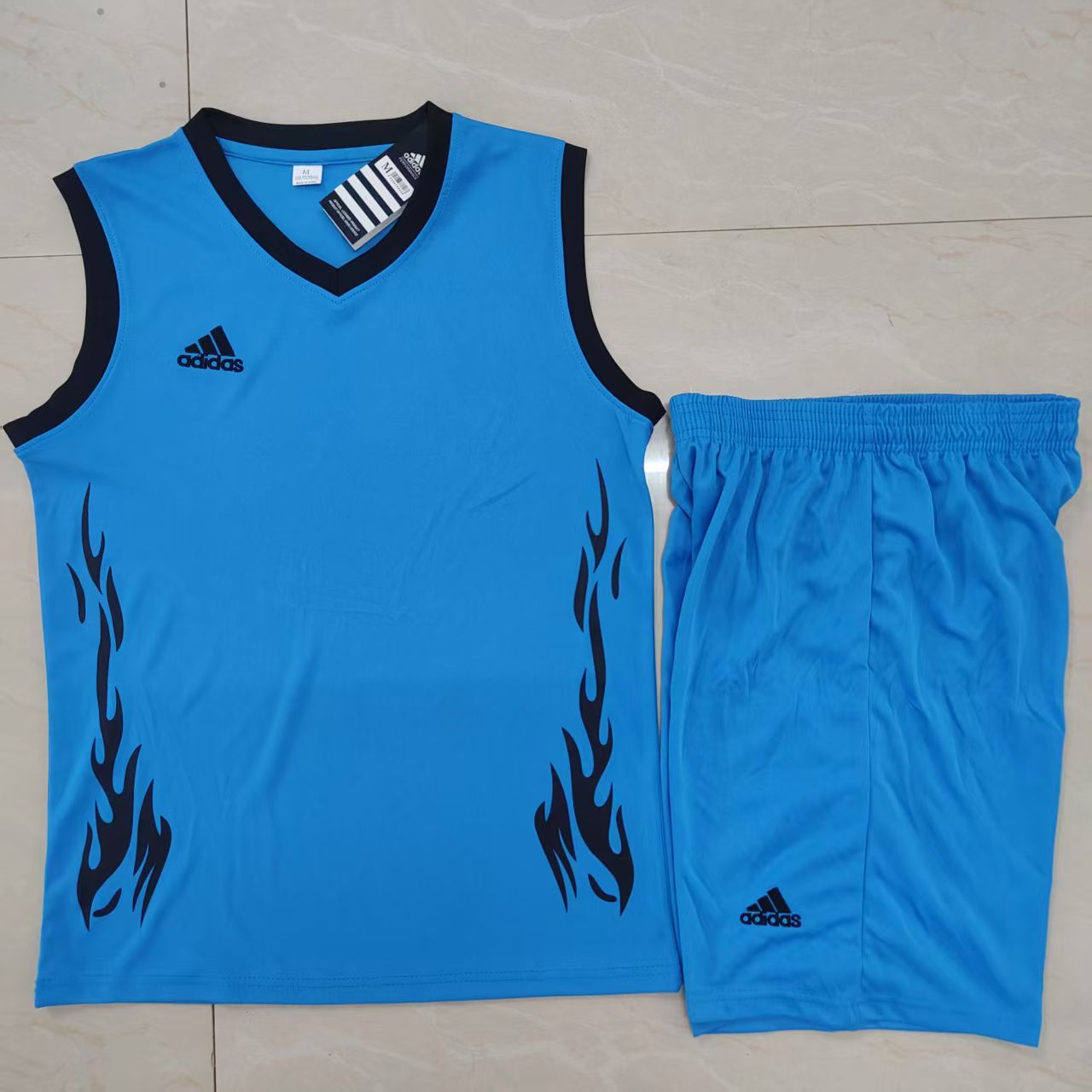 Custom Adidas blue basketball jersey set printed by Jumotas Technologies