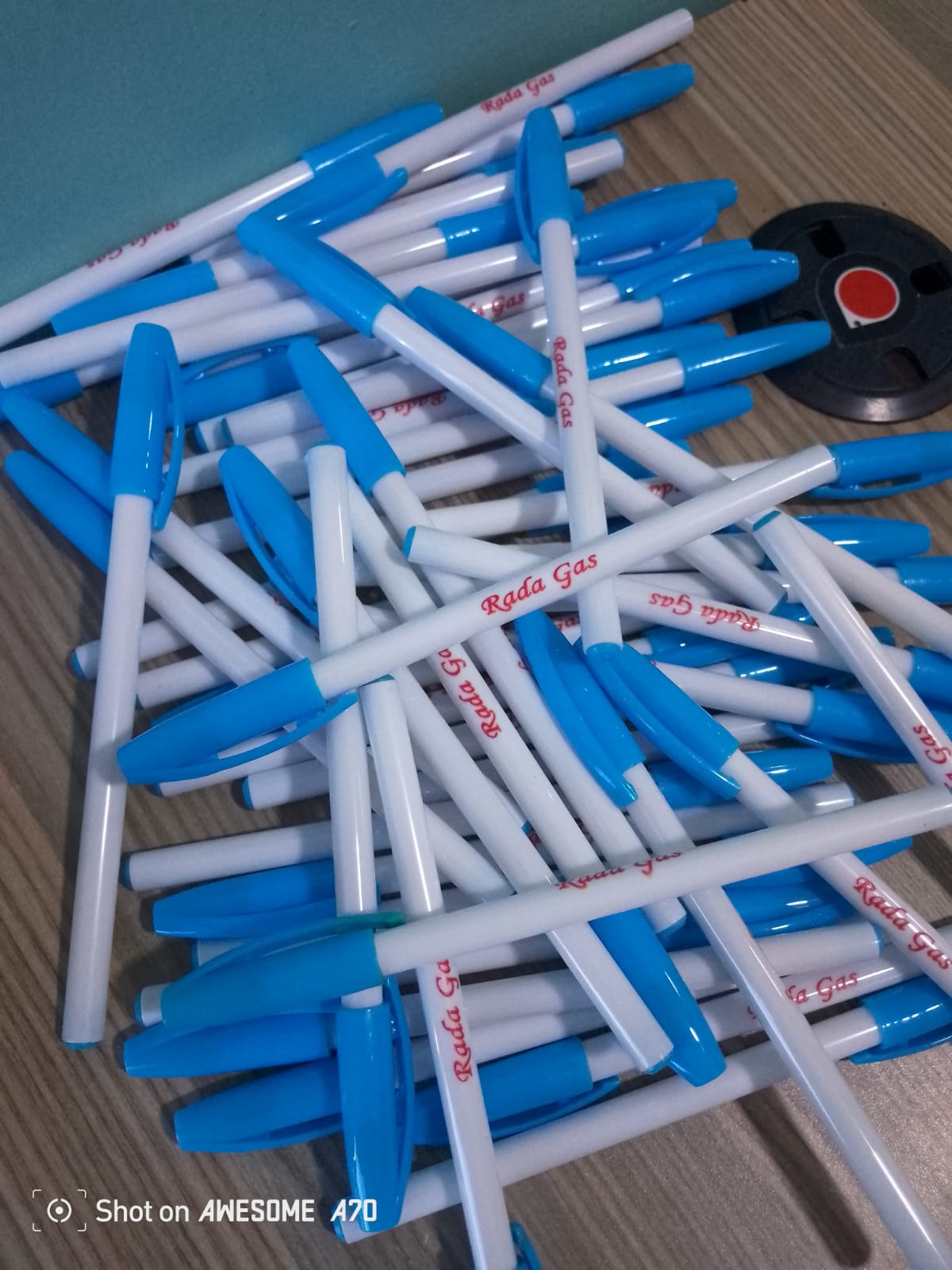 Batch of branded promotional pens printed for Rada Gas by Jumotas Technologies